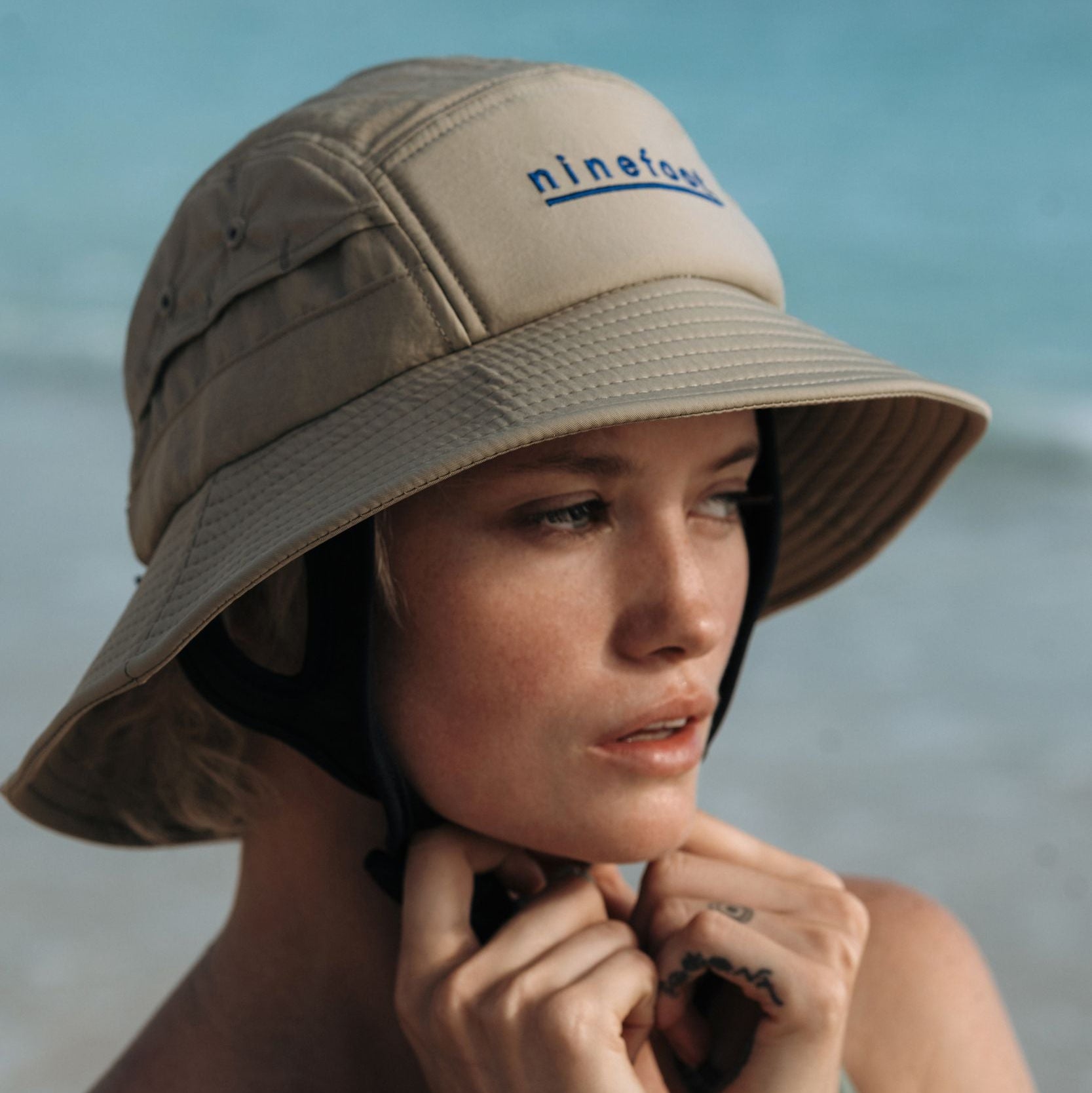 Ninefoot Studio Jade Surf Hat in Army Green color with adjustable strap