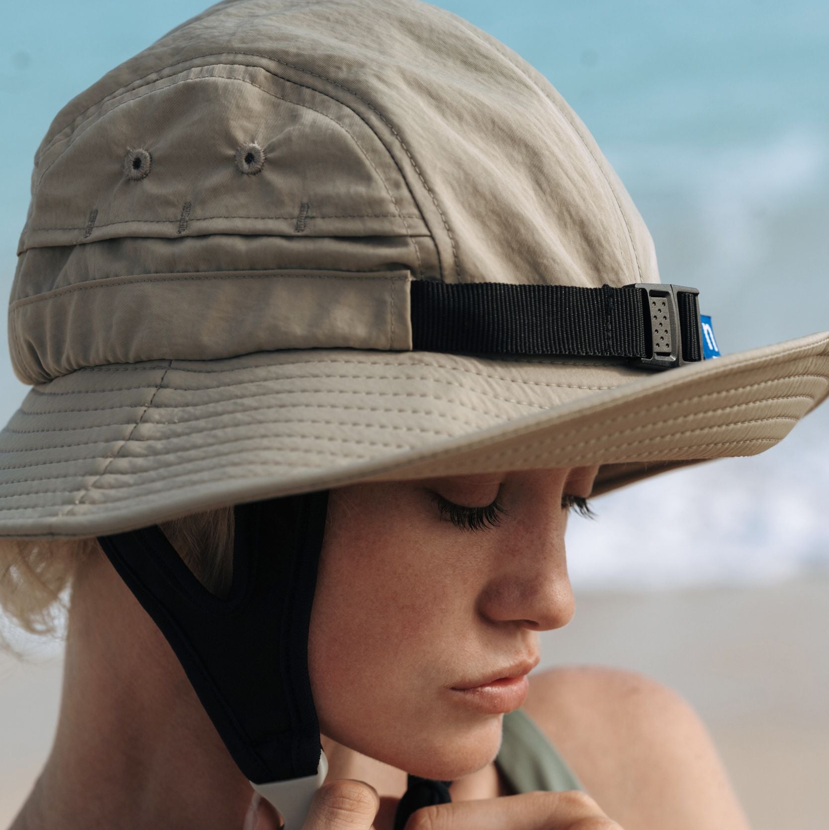 Ninefoot Studio Jade Surf Hat in Army Green color with adjustable strap