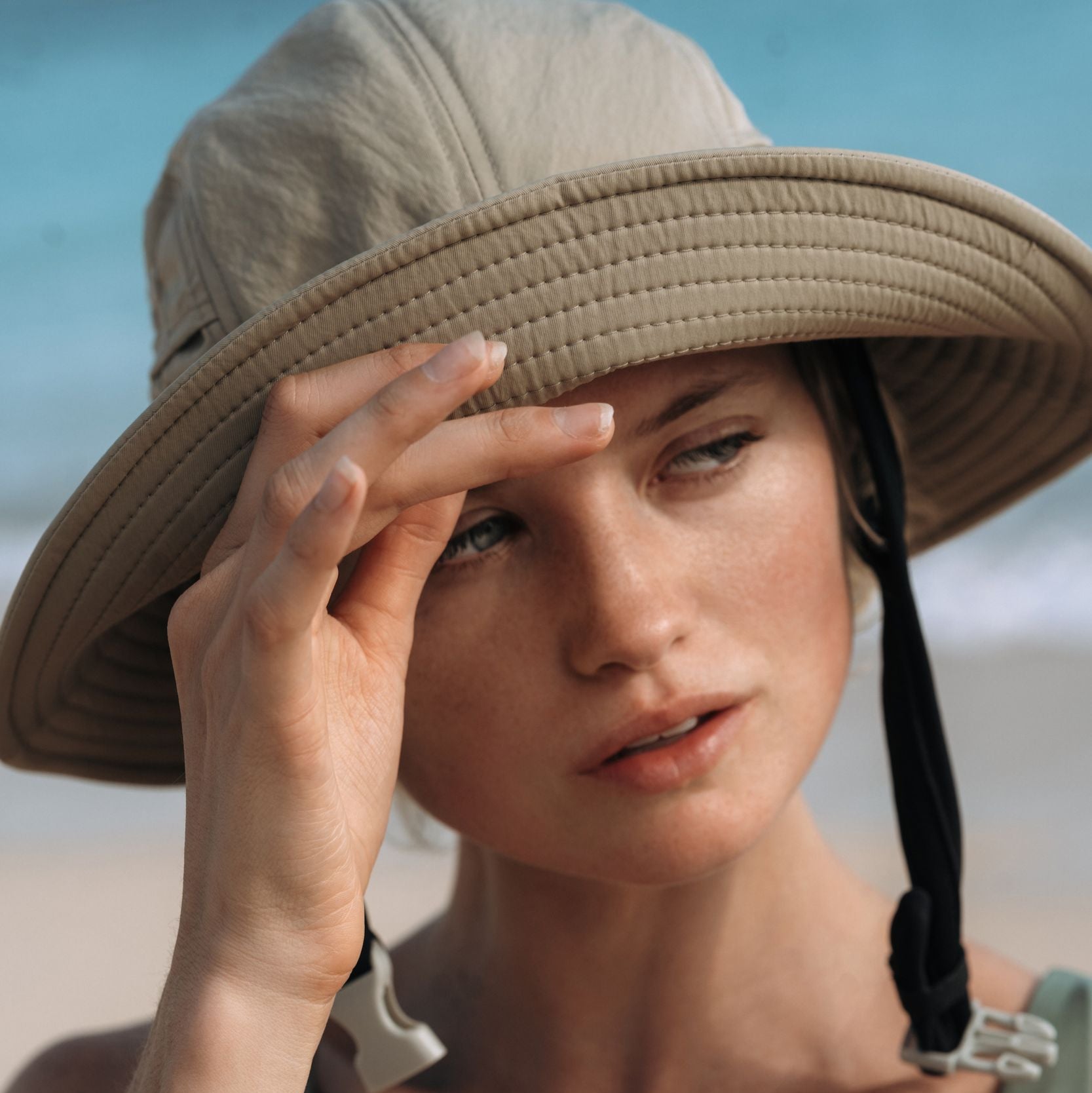 Ninefoot Studio Jade Surf Hat in Army Green color with adjustable strap