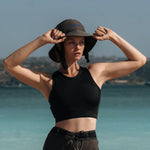 Ninefoot Studio Jade Surf Hat in black color with adjustable strap
