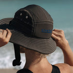 Ninefoot Studio Jade Surf Hat in black color with adjustable strap