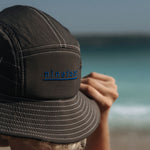 Ninefoot Studio Jade Surf Hat in black color with adjustable strap