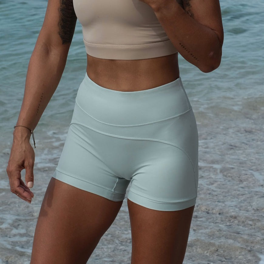 gerupuk yoga and surf shorts in mint color front side