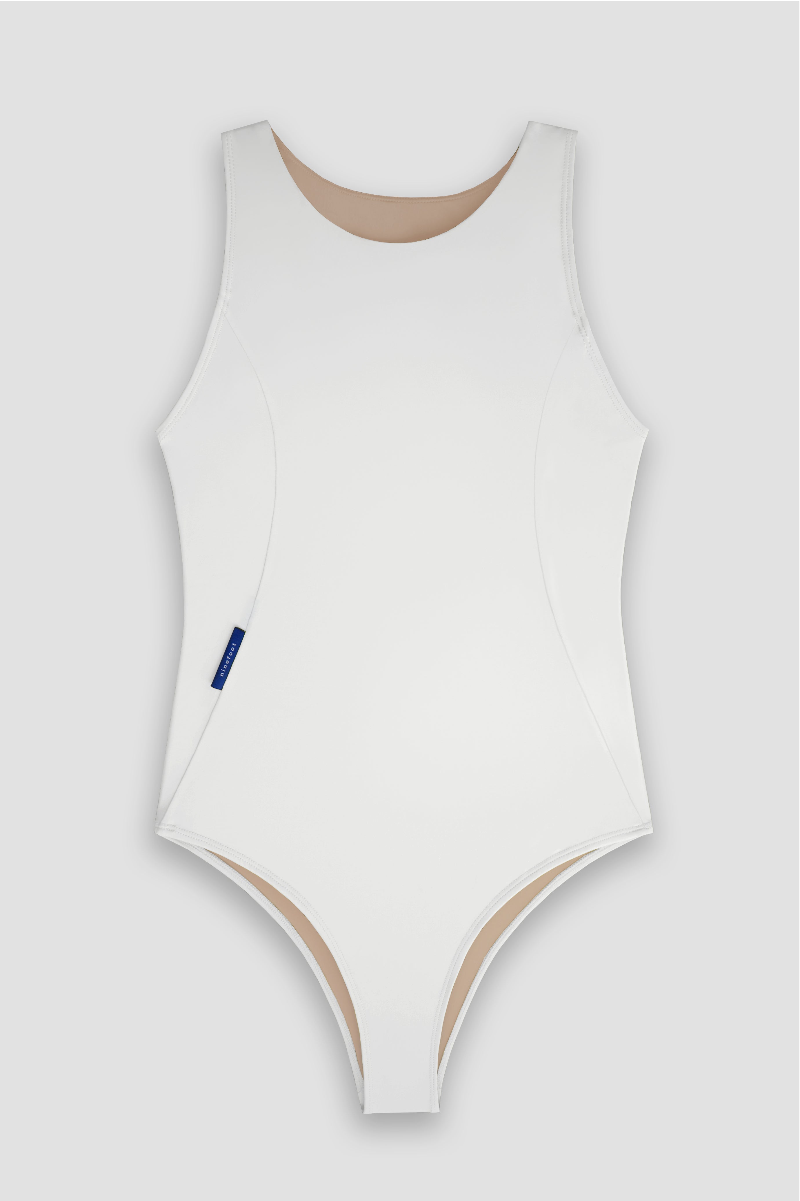 Krui Onepiece Surf Swimsuit in White Flat photo front