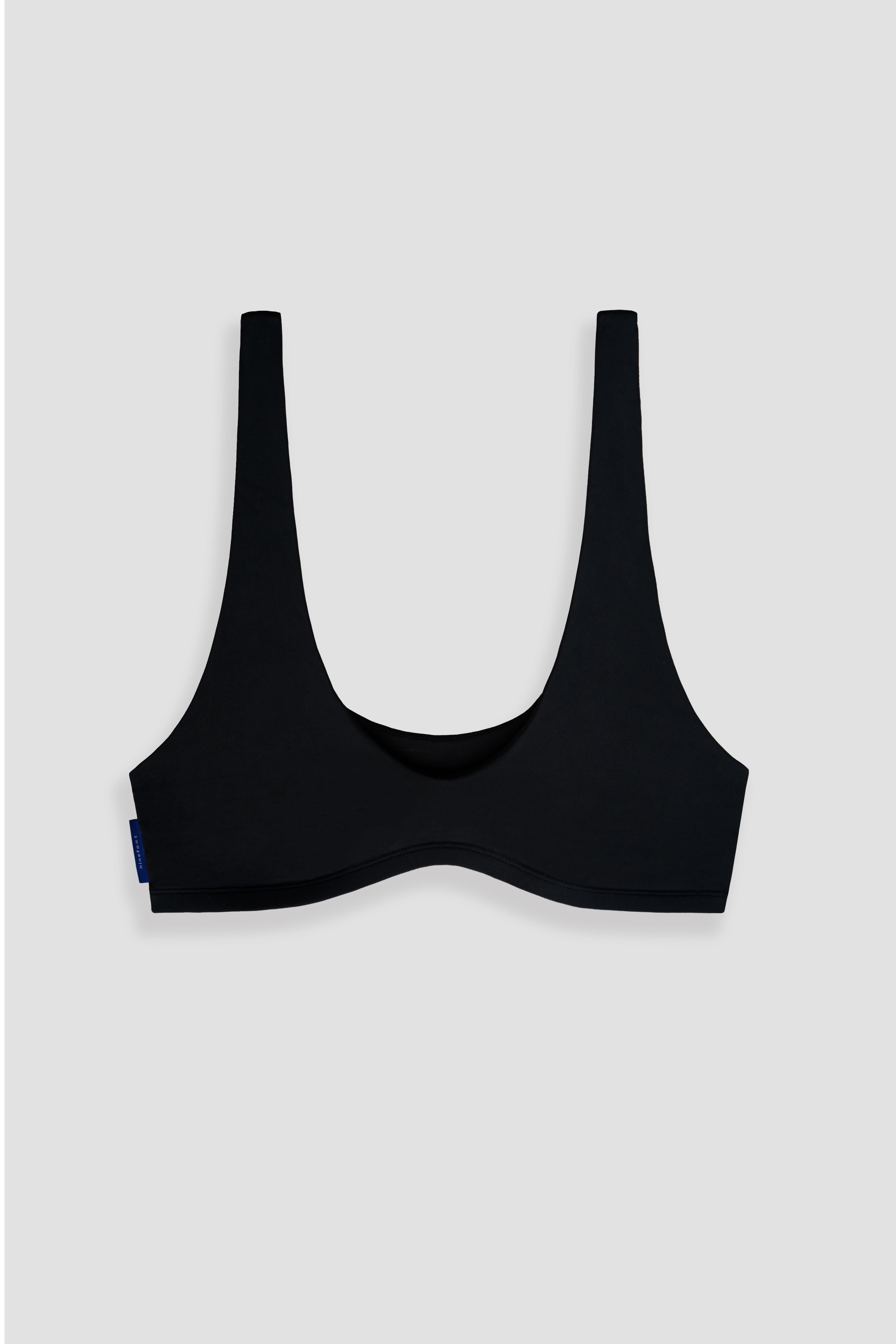 nias surf top in black color flat image front side