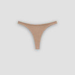 Ninefoot Studio sand-colored recycled fabric thong bikini bottom – sustainable women's surfwear made in Bali